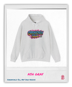 Hoodie featuring “Chronically Ill, Not Ugly” graffiti design with bold street-art lettering in pink, blue, and yellow.