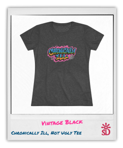 Soft, fitted, t-shirt with “Chronically Ill, Not Ugly” graffiti design in bold pink, blue, and yellow street art lettering.