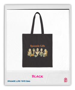 Black canvas tote bag featuring the Spoonie Life graphic with cartoon spoons illustrating everyday chronic illness experiences.